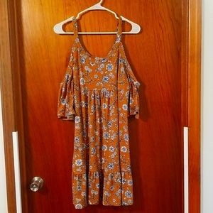 Mustard, white, and blue floral dress.